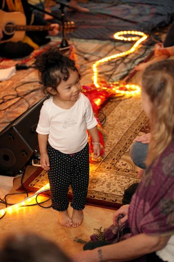 Layla has been coming to kirtan since she was in Robyn's tummy! She blesses us all!
