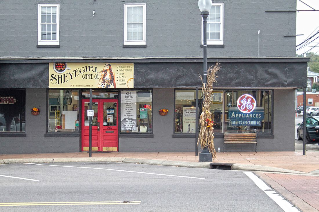 Outside the front of the shop.
