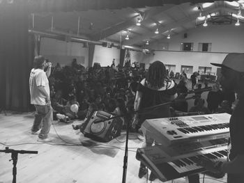 On stage in black and white
