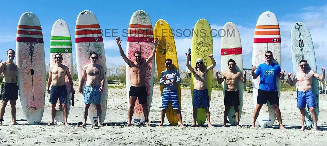Friends enjoying a group surfing experience on Tybee Island
