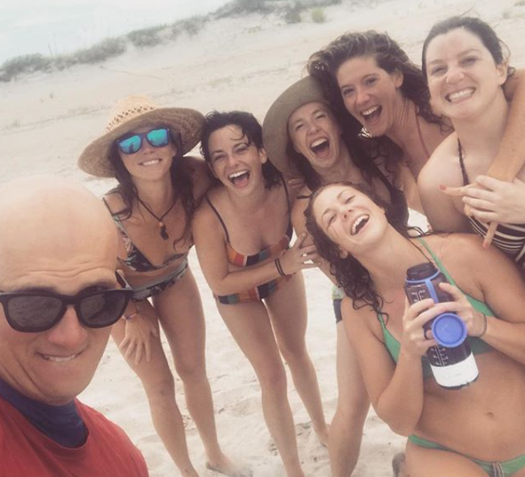 Group surf lesson with smiling students near Savannah, GA