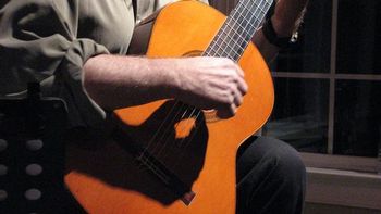 Classical Guitar at a house concert in West Chester Pa. ...good right hand form

