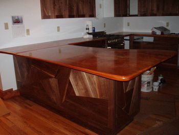 Kitchen in Walnut....Cherry tops 6 Walnut mozaic
