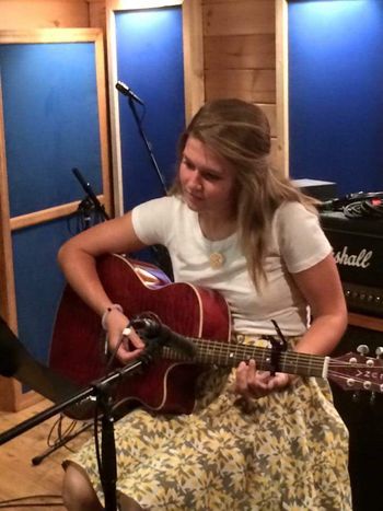 Gena Lucas tracking acoustic guitar
