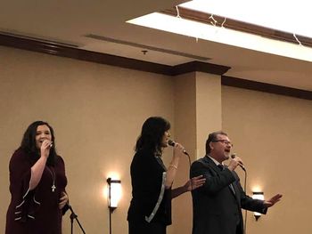 Faithful Crossings singing at the SGPA Breakfast

