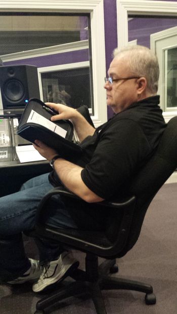 Les Butler focusing on arrangement notes
