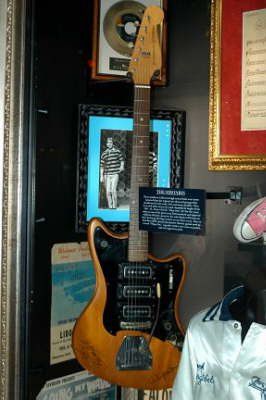 Bob's '64 Jansen Jazzman in the glass case at The Hard Rock Cafe-  - Bob is pictured playing this guitar on the cover of The Surfaris Live Album featured to the left
