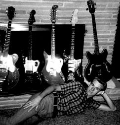 Bob posing with his guitars in 1965  L-R  6122 Gretsch Chet Atkins Country Gentleman, '64 Fender Jaguar, '64 Fender 12 string,  '64 Jansen Jazzman (Made in Auckland, NZ), Guild Starfire Bass
