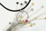 ES:MO official necklace and bracelet (made from Guitar Strings!)