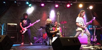 Assault rockin' the stage

