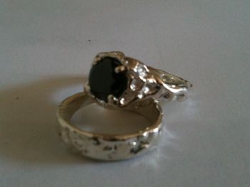 I designed these sterling bands to combine the organic with the tailored appeal of finely tooled high end jewelry. Though the iPhone 3 refused to focus on the silvery, cavernous and buffed twining, I think it still speaks for itself.
