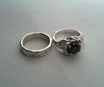 Platinum wedding set with black diamond center stone
