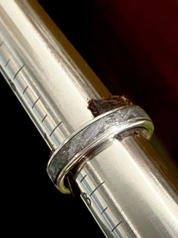 Custom platinum wedding band with 3mm wide meteorite inlay. The octahedrite, iron material was sourced from the Aletai meteorite in China. ☄️
