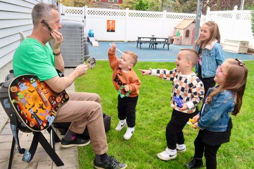 Music With Patrick performing at party for children on Staten Island