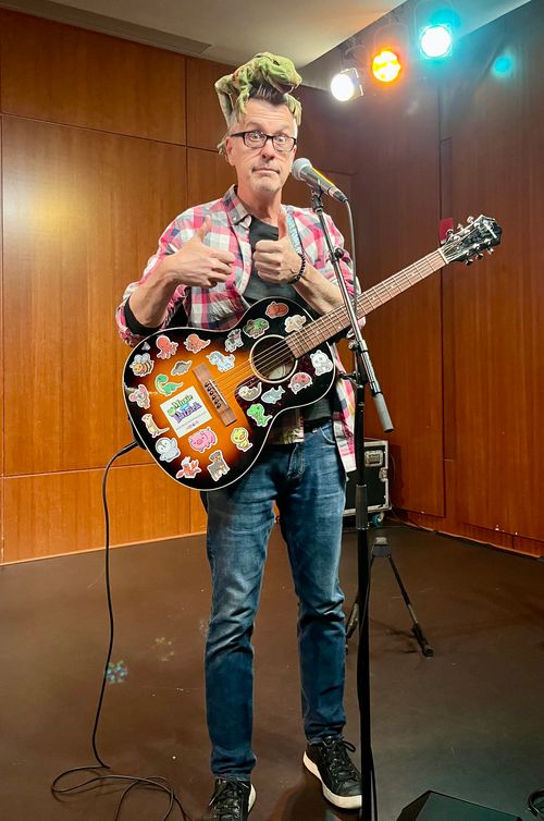 Music With Patrick on stage at the Brooklyn Public Library