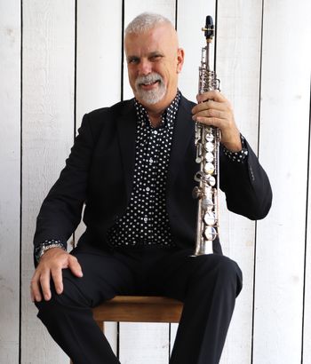 Paul James - saxophones, bagpipes, keyboards, electric guitar, percussion, synths, programming.
