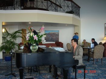 Jazz Duet - Saxophone and Piano Behind the vase is John Franzosa, tenor sax, alto sax and flute. Carl Reppucci, Piano
