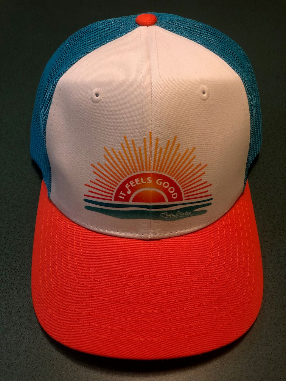 "IT FEELS GOOD" Trucker Cap