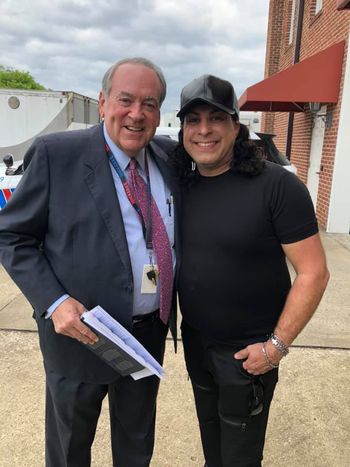 David Ferrari with Governor Mike HuckAbee.
