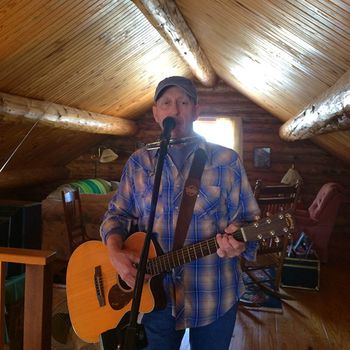 Jim Earle in cabin
