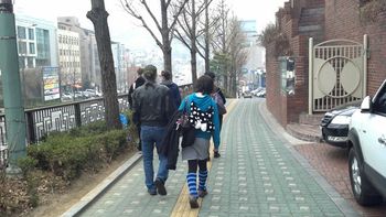 Walking down the hill from the apartment.
