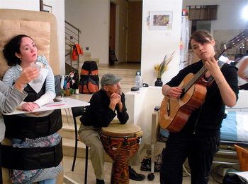 Singing at a friend's home. We met them last trip in Alin Hospital.
