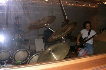 01/31/2005 Rocking out on the bass, live on "Rock the Nation" KGNU Radio Boulder with -YUKON->  Boulder, CO
