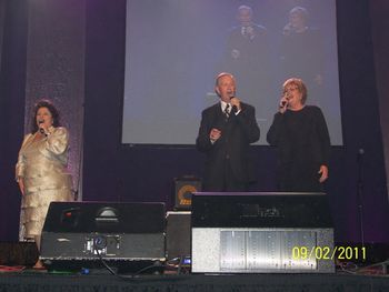 The whole group with Debbie and Ernie on the big screen.

