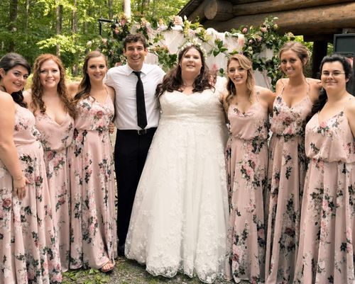 Princeton wedding musician Johnny Walylko posing with a bride and six bridesmaids at a rustic woodland wedding.