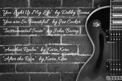 Guitar against a brick wall grayscale