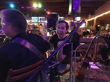 Andy Sarraf of The Fab Four sitting in
