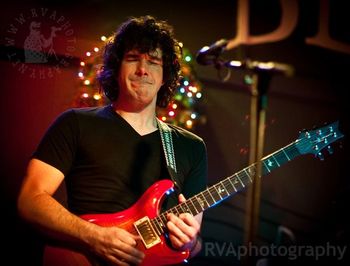 Guitar face. It looks like I'm dippin' chaw or something.
