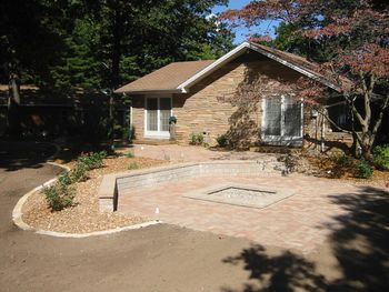 Upper level patio and lower patio with fire pit
