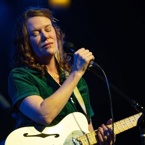 Bre Gregg singing on stage Portland Oregon. 