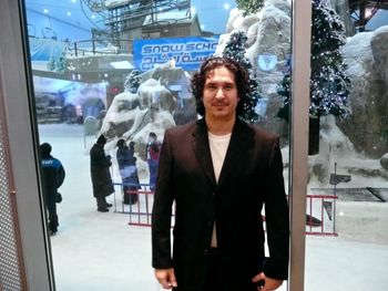 Skiing in a mall in the desert on the Earth out in space in the solar system in the Milky Way in the universe.
