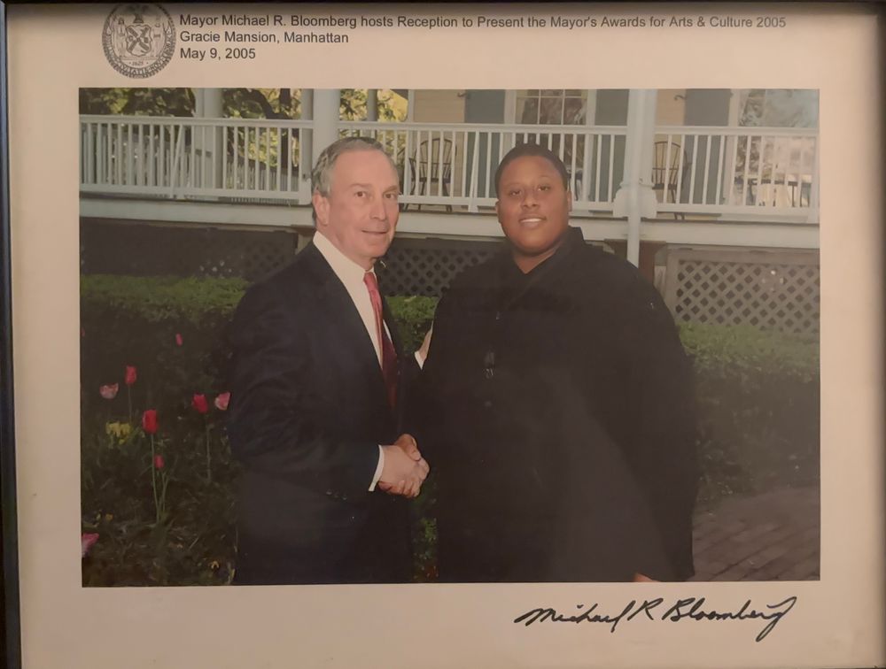 Saxophonist David TV Barnes shaking hands with Mayor Michael Bloomberg at the 2005 Mayor's Awards for Arts and Culture