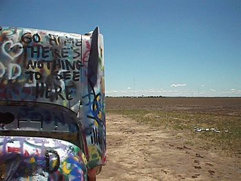 Photo for "Tired World" taken at the Cadillac Graveyard
