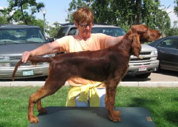 Margaux at 5 months old with good friend Winnie Arland stacking.
