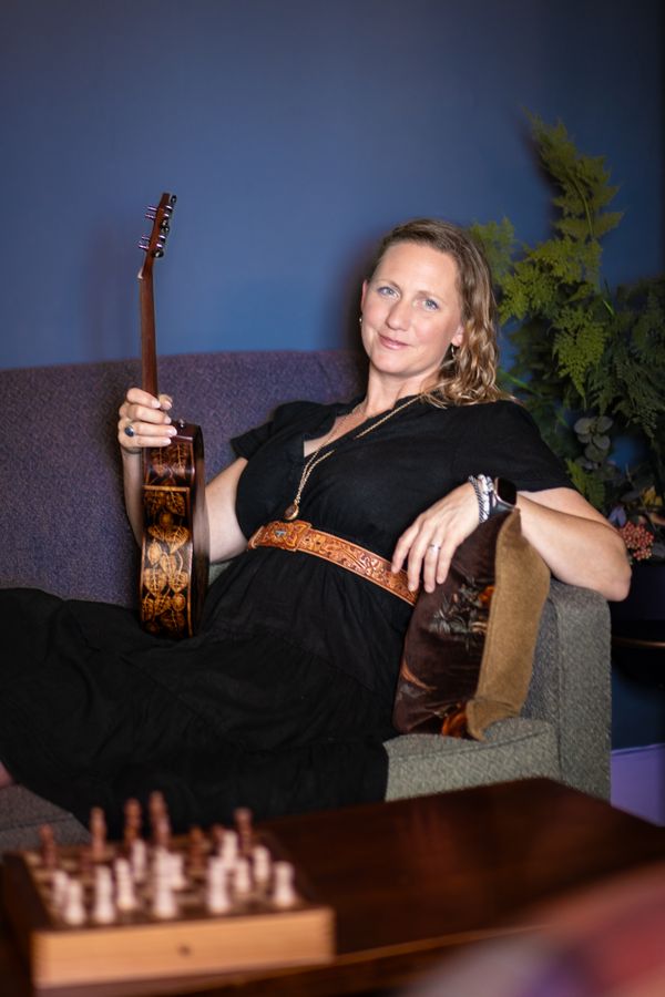 Victoria Vox plays the ukulele