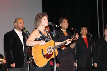 Singing "One Night".
