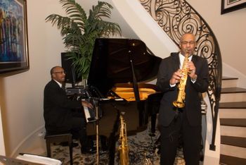 Twin Connection Duo performing at Private Art Showing Event at clients home.
