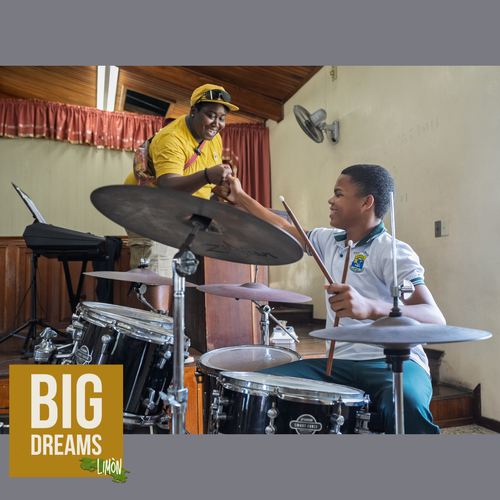 Z. Lawrence works with a young drummer at Big Dreams Workshop in Limòn, Costa Rica