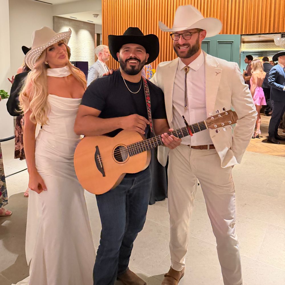 Solo musician performing at a Houston engagement party