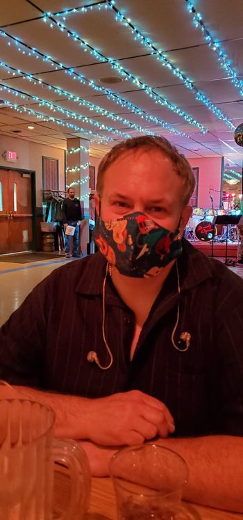 Jim proud of his guitar mask at the Eagles..
