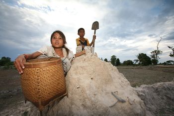 Phet & Nomvan Morachit who collect bomb scrap metal in Savannakhet, Laos
