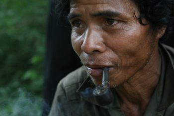 Cho Tai villager waits for bomb detonation
