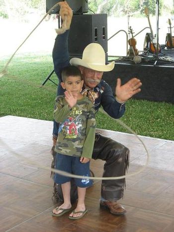06-26-08 Master Trickroper with a young assistant from the crowd
