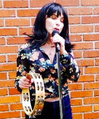 Debbie Rider as Linda Ronstadt