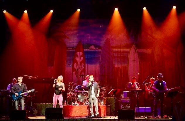 The Pictures Band performing at a high-energy corporate gala in Austin.
