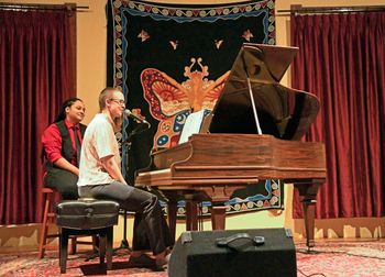 Performing at Tunesmith, Wallowa Valley Music Alliance's songwriters in the round event, Feb 2024. Photo courtesy of Roger Averbeck.
